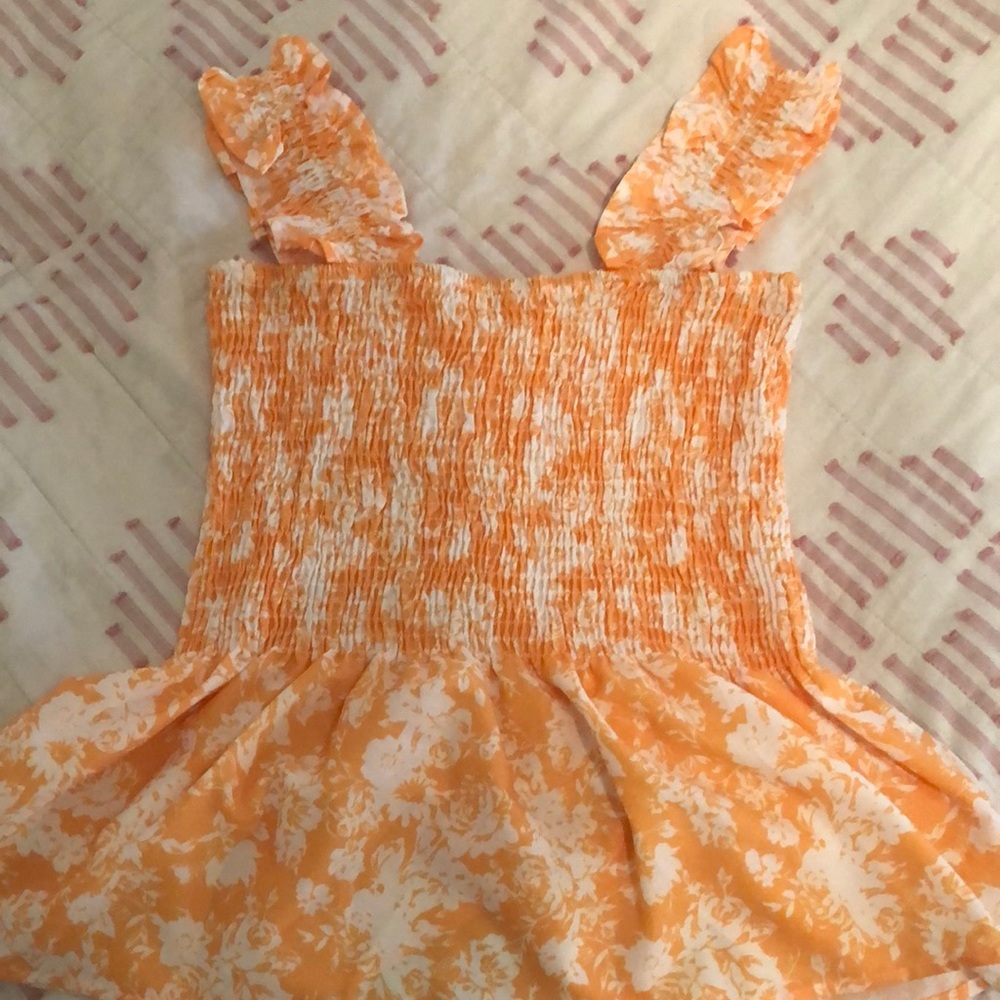 Yellow peplum top